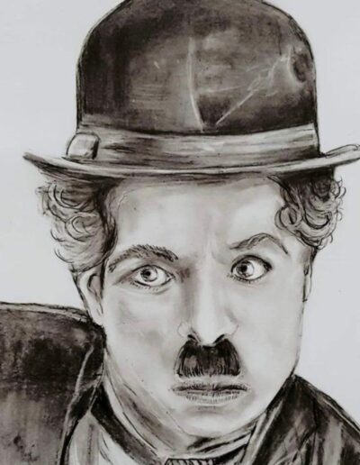 Porträt von Charlie Chaplin in Schwarz-Weiß-Zeichnung